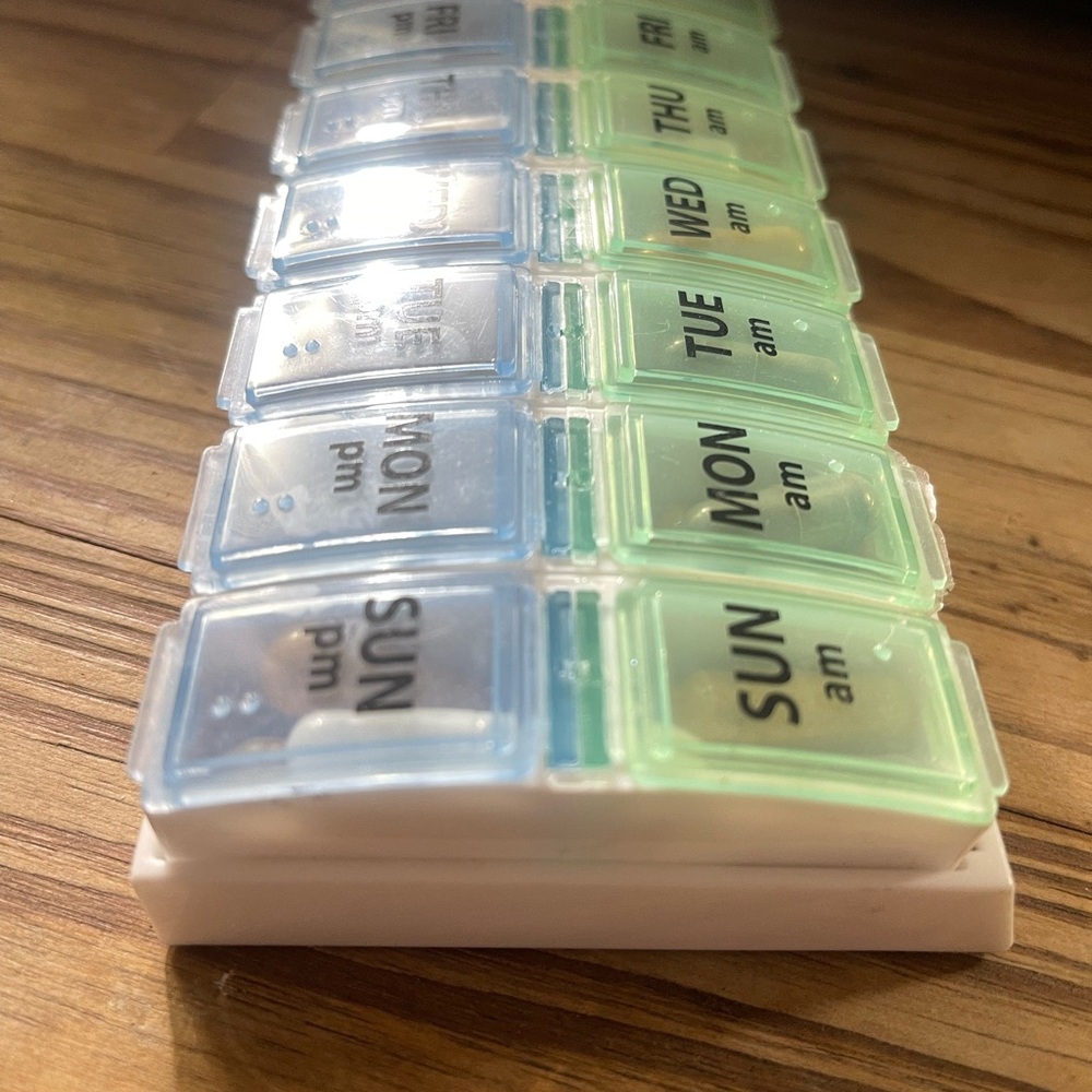 Weekly Pill Organizer with Blue and Green Lids two weeks (empty)